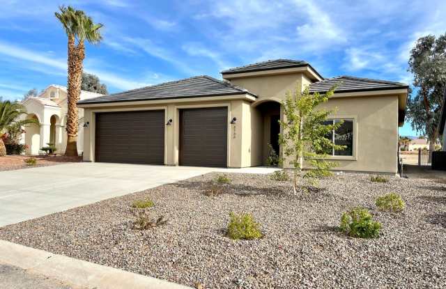 Beautiful 3 Bedroom Home on Desert Lakes Golf Course! photos photos