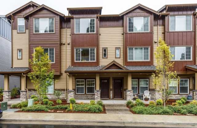 Photo of Neat and Tidy Newer Town Home with Two Master Bedrooms and Den on the Main Level