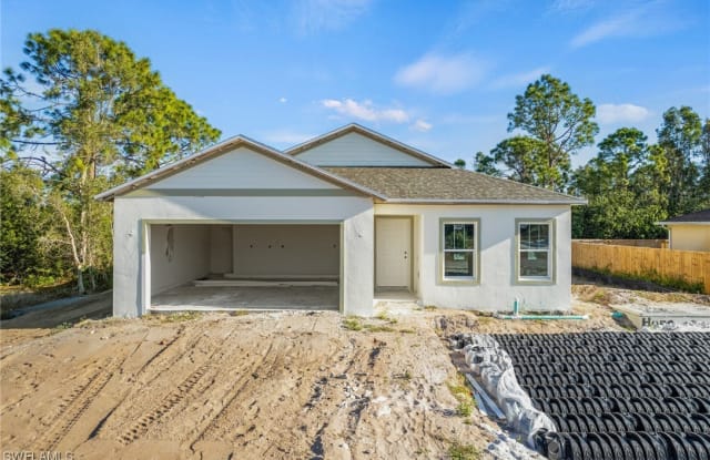 447 RAYMER Street - 447 Raymer Street, Lehigh Acres, FL 33974