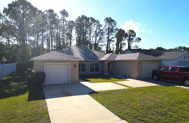 Photo of Roomy 3 bed 2 bath Duplex Home for Rent in Palm Coast!