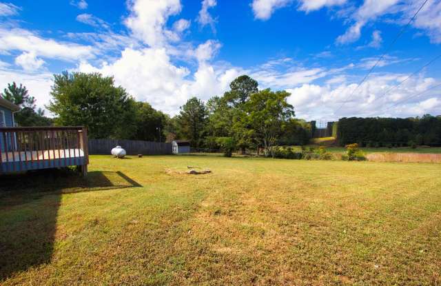 MOVE IN READY– Loganville Gem with Large Fenced Yard  Outdoor Living!