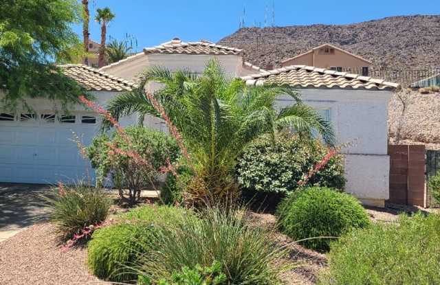 1 story home with 2 car garage in a gated community