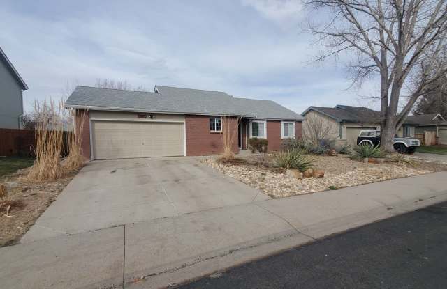 Beautiful 4 Bedroom Home with Large Basement and Fenced in Yard Available ASAP! - 367 Sun Mountain Drive, Loveland, CO 80538