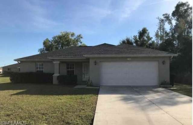 218 MANATEE ST - 218 Manatee Street, Lehigh Acres, FL 33913