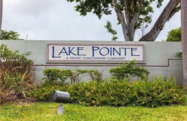 201 Lake Pointe Dr - 201 Lake Pointe Drive, Oakland Park, FL 33309