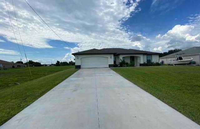 23 NW 27th LN - 23 Northwest 27th Lane, Cape Coral, FL 33993