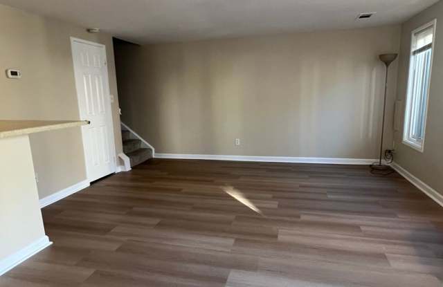 RENOVATED 2 LEVEL TOWNHOUSE WITH UPDATED KITCHEN AND BATHROOM