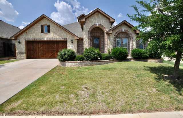 Photo of FOR LEASE in ALEDO ISD! Beautiful 3,000+ sf Brick Home with 4 Bedrooms, 3 Bathrooms Plus an Office  Upstairs Flex/Loft Area in a Nice Neighborhood on A Quiet Cul-De-Sac.