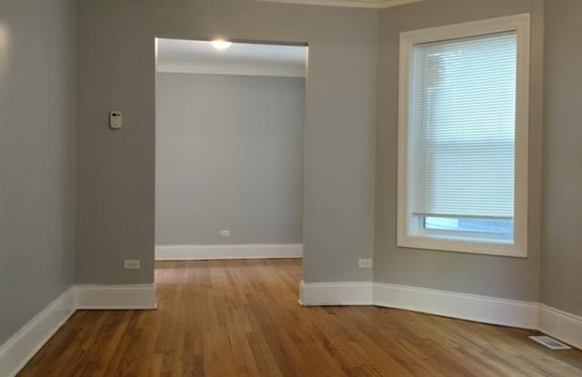 7408 South Eberhart Avenue - 1R