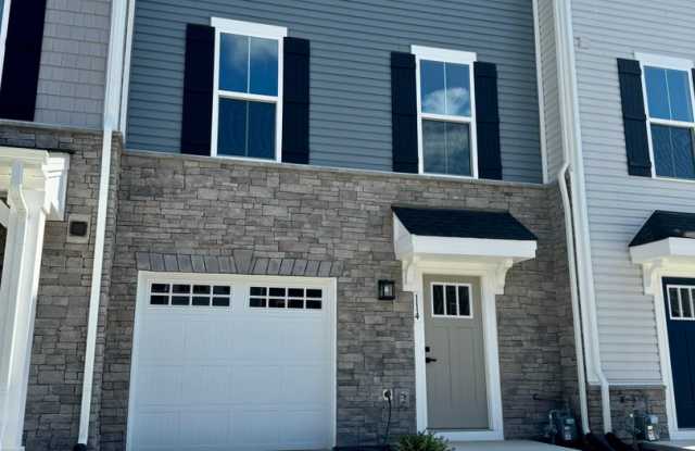 Brand New!! 3 Bedroom Townhouse w/garage located in Poquoson with a Free First Month's Rent With A 2 Year Lease