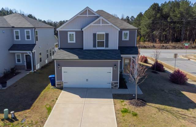 Like New 4 Bed / 3 Bath single family home with 2 car garage, large loft, downstairs guest suite and spacious living space. photos photos