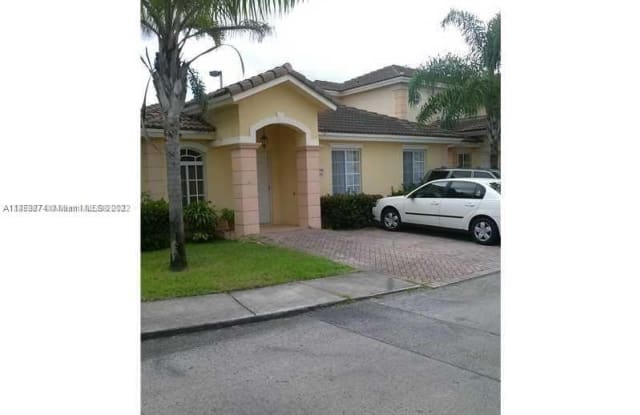 7359 NW 173rd Dr - 7359 NW 173rd Dr, Country Club, FL 33015