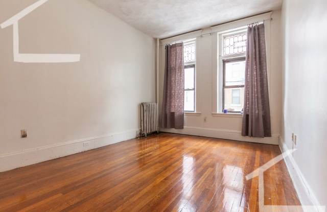 Amazing two bedroom unit with easy MBTA access! photos photos