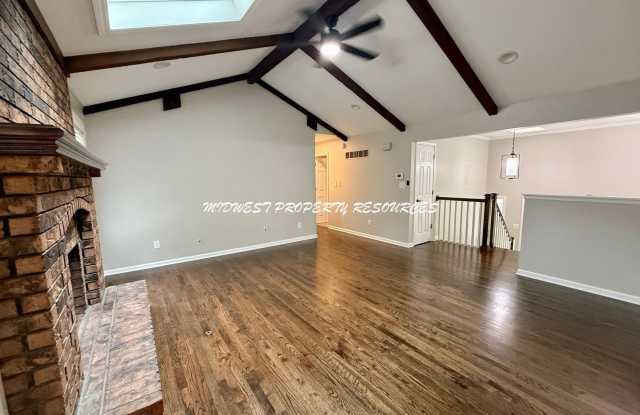 Newly Remodeled 3 Bed, 2.5 Bath Home with Vaulted Ceilings, Finished Basement & Fenced Yard!
