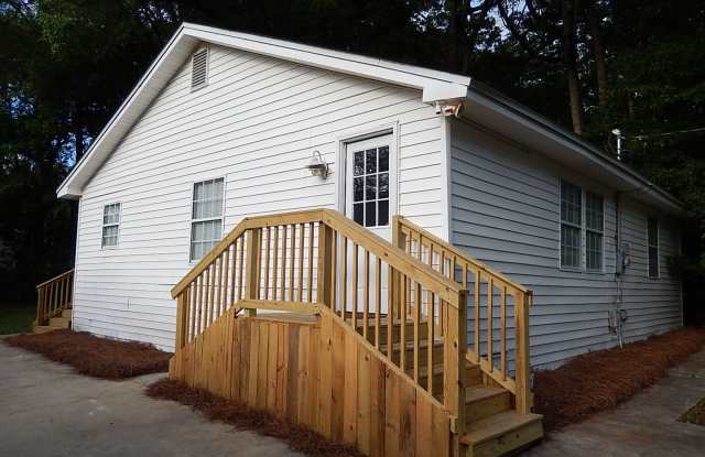 Recently RENOVATED 3/2 w/ Stainless Steel Appliances, Plank Vinyl Throughout, Washer/Dryer,  Large Yard! Avail December 17th for $1550/month!