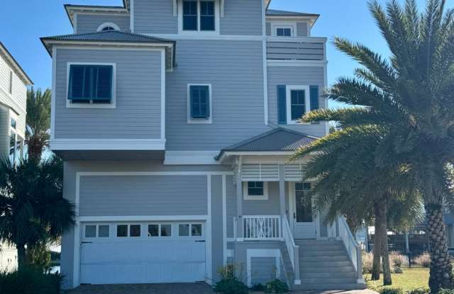 Photo of Waterfront Shell Point Home with Dock, Hot Tub, Elevator,  Golf Cart