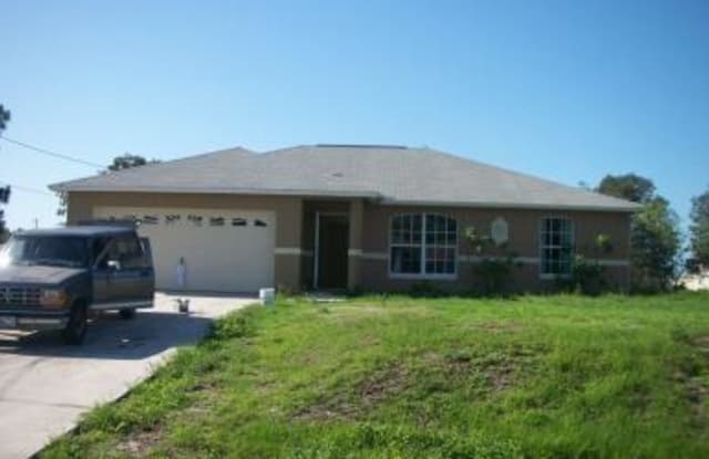 370 Clairidge CIR - 370 Clairidge Cir, Lehigh Acres, FL 33974