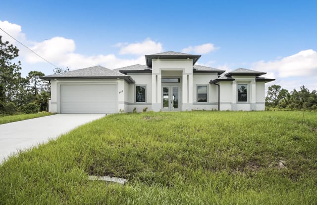 222 Hagan Ave - 222 Hagan Ave S, Lehigh Acres, FL 33974