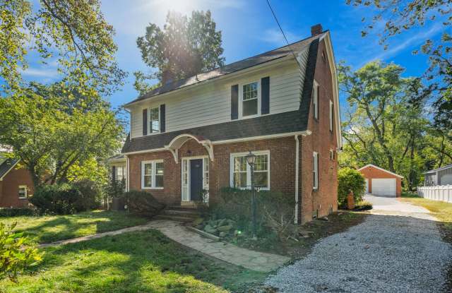 Tastefully Updated 3 Bed, 2 Bath Home - 2 Stall Garage, Spacious Level Yard - Available 2/1 in Forest Hills!