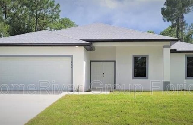 405 W 7th St - 405 West 7th Street, Lehigh Acres, FL 33972