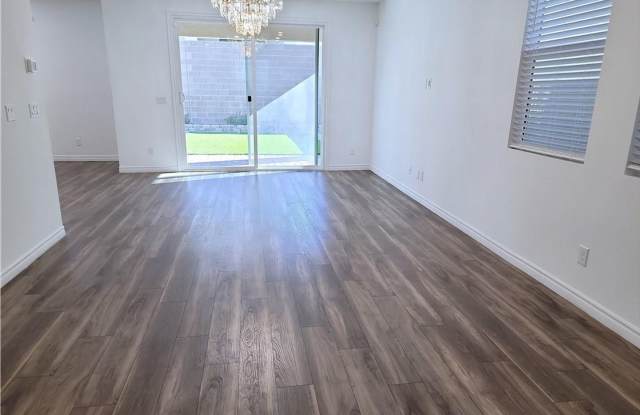 Energy-Efficient 4-Bedroom Home with Downstairs Bedroom  Outdoor Entertaining Space