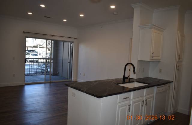 Beautiful Ground Floor Condo in Falling Water Condominiums!!