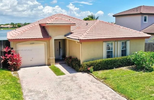 12279 SW 140th St - 12279 SW 140th St, Three Lakes, FL 33186