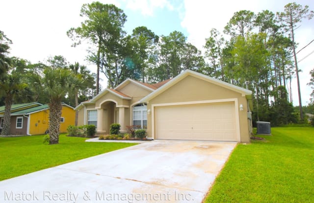 16 Poinciana Ln - 16 Poinciana Lane, Palm Coast, FL 32164