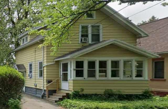 3-Bed Home w/ Driveway & Enclosed Porches – Convenient Rochester Location