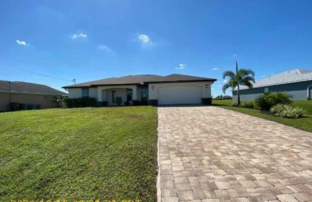 410 NW 20th TER - 410 Northwest 20th Terrace, Cape Coral, FL 33993