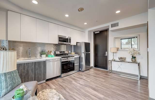 Brand New Building featuring 1 & 2 bedroom Flats & Townhomes!