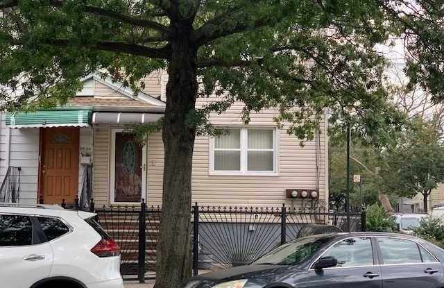 98-02 Corona Avenue