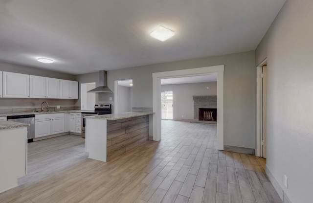 UPTOWN RENOVATED 3 Bedroom 2 Bath with garage