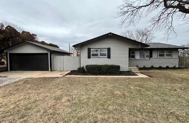 Charming 4-Bedroom Home with Spacious Living Areas  Large Lot!