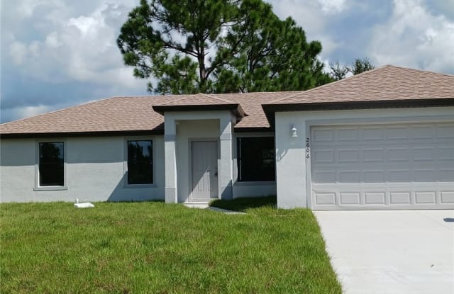 2606 9th Street SW - 2606 9th Street Southwest, Lehigh Acres, FL 33976