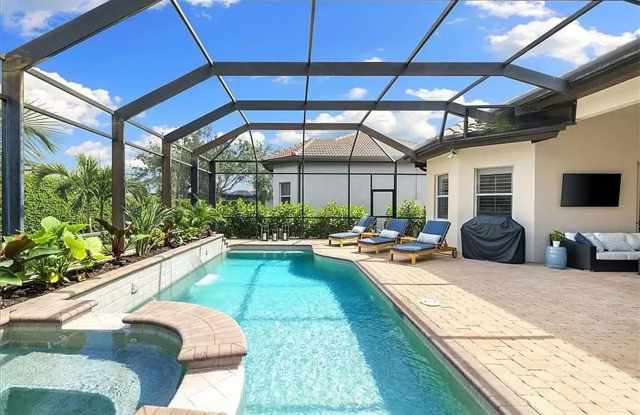 ***AVAILABLE NOV-DEC 2024 ** STUNNING HEATED PRIVATE POOL AND SPA 3BED+DEN/2BATH HOME***ASHTON PLACE LELY RESORT***PLAYERS CLUB AND SPA ACCESS***