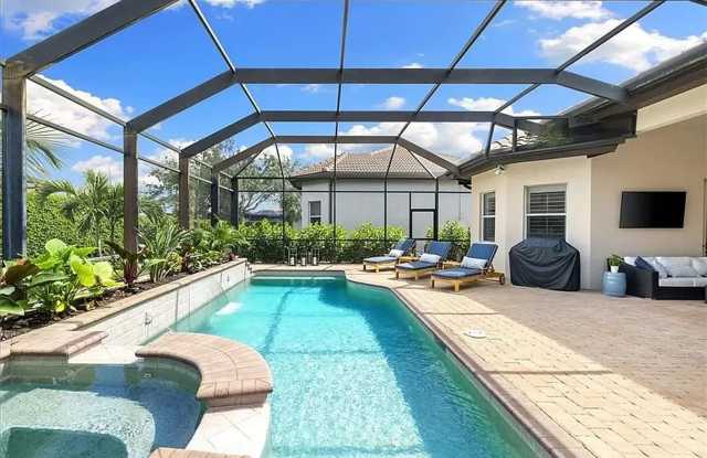 ***STUNNING HEATED PRIVATE POOL AND SPA 3BED+DEN/2BATH HOME***ASHTON PLACE LELY RESORT***PLAYERS CLUB AND SPA ACCESS*** - 7831 Valencia Court, Lely Resort, FL 34113