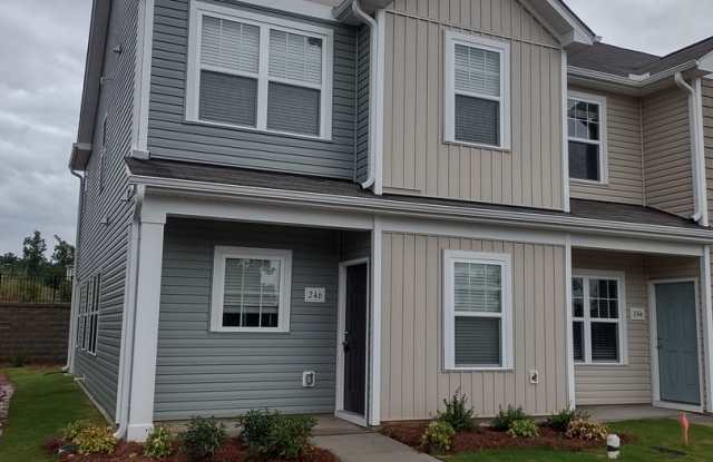 Photo of BRAND-NEW Townhome Located in Sanford- Minutes from Shopping, Dining, and Community Parks! Wont last long- Call Today!
