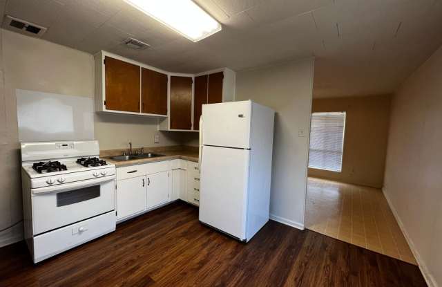 3 Bedroom, 1.5 Bathroom, Brick Home with yard and Storage Building