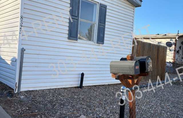 Welcome to the charming Riverdale Farms subdivision in Thornton, CO, where a delightful 3-bedroom, 2-bathroom home awaits you