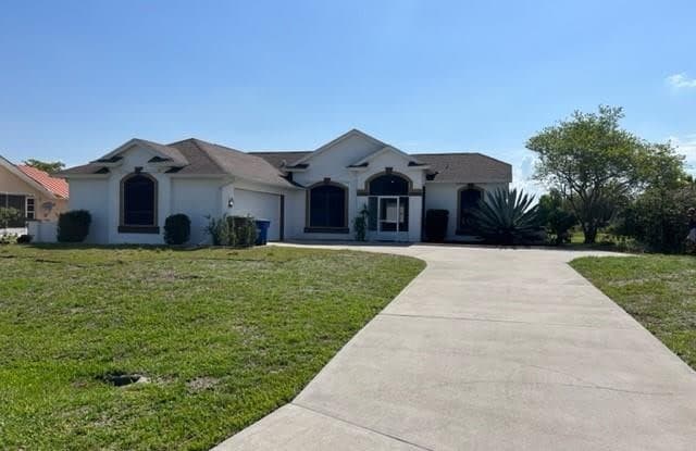 239 Lauberge CT - 239 Lauberge Court, Lehigh Acres, FL 33936