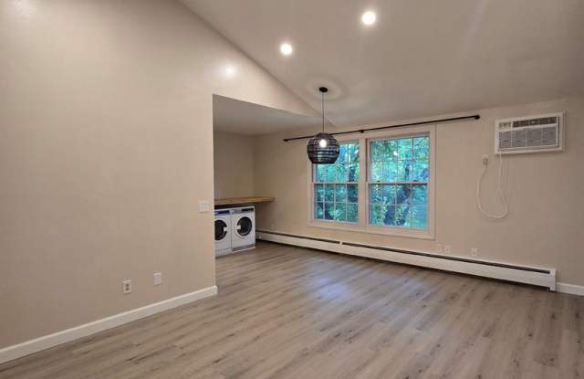 Move-in special! Reduced security deposit. Hopkins condo with in-unit laundry and lots of community amenities