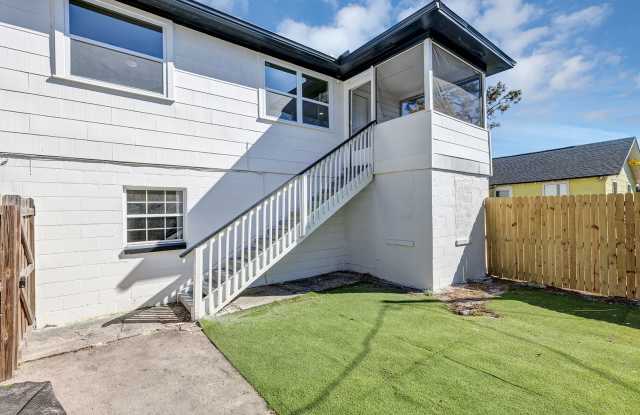 Bright  Updated 2BR Top Unit Duplex | White Kitchen  Stainless Appliances in Saint Petersburg