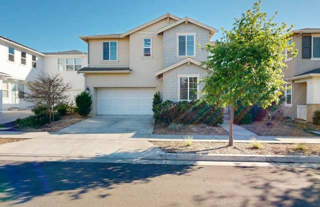 Bright & Beautiful 4 Bedroom 3 Full Bathroom Home!