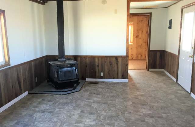 2 bedroom single wide with a large garage/shop in Spring Creek - 396 Berry Creek Drive, Spring Creek, NV 89815