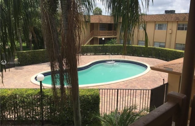 2437 NW 39th Terrace  Unit #204 - 2437 Northwest 39th Terrace, Lauderdale Lakes, FL 33311