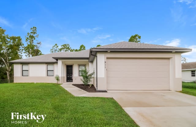 911 Henry Avenue - 911 Henry Avenue, Lehigh Acres, FL 33972