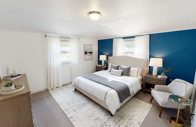 Quaint home with flexible layout, updated kitchen, and a private-feeling backyard in convenient Westwood