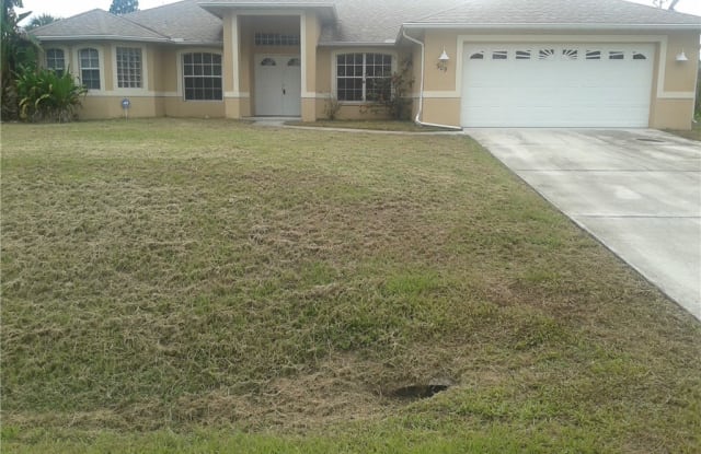 909 Cleveland Avenue - 909 Cleveland Avenue, Lehigh Acres, FL 33972