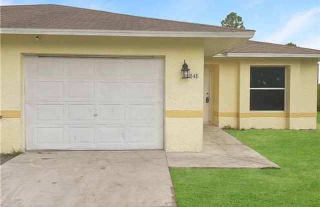 848 Holmes AVE - 848 Holmes Ave, Lehigh Acres, FL 33974